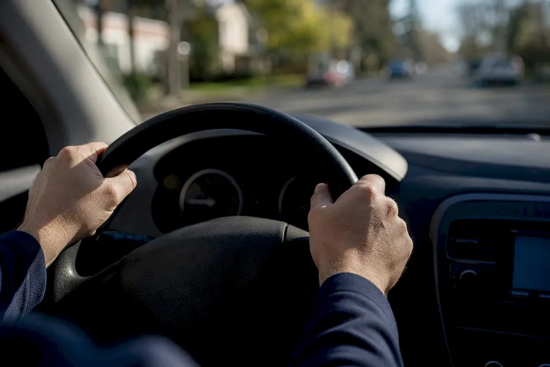 Technician conducting an automotive road test